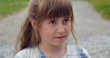 portrait of a young girl with forelock