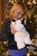 happy baby near the christmas tree