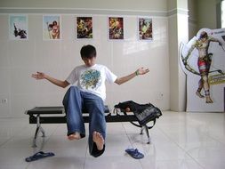 asian man sitting on a bench