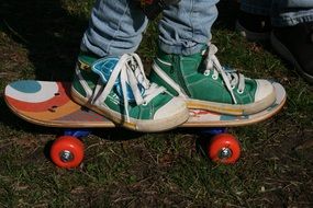 legs on a skateboard close up