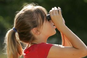 girl with black binoculars