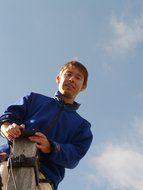 man against the blue sky