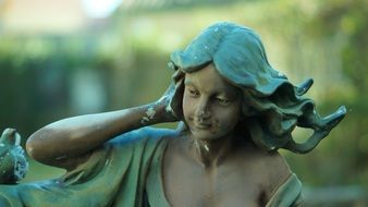 girl with blue hair sculpture