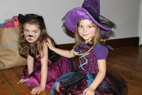 Portrait of two girls in Halloween costumes