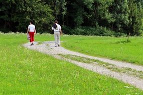 young couple walking on the road