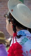 girl in a hat in bolivia