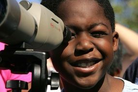 black child looks into the lens