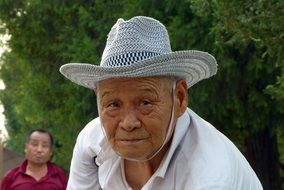 portrait of an elderly Chinese in nature