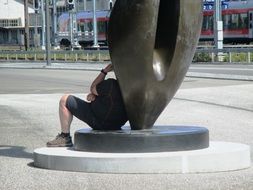 tired man sitting in the shade