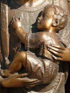 bronze statue with a child