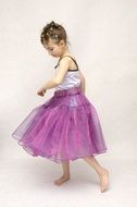 Child is dancing ballet