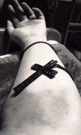 hand with religion cross close-up