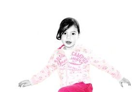 portrait of a little girl in a sports uniform