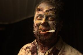 portrait of a zombie with cigarettes