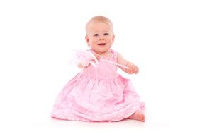 baby girl in pink dress