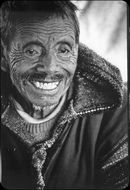 Black and white photo of the laughing man