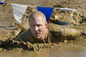 run mud competition obstacle pit