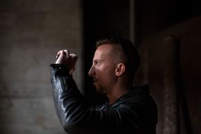 Photographer man in a jacket