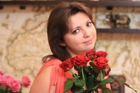 girl with a bouquet of red roses