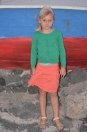 nice blond girl standing on stone