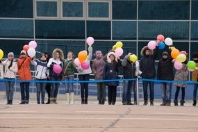 the crowd celebrates the return of the astronaut