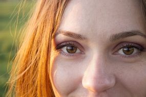 girl with brown eyes and red hair