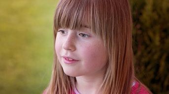 photo of a girl with long bangs