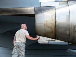 strong man checking at jet air show