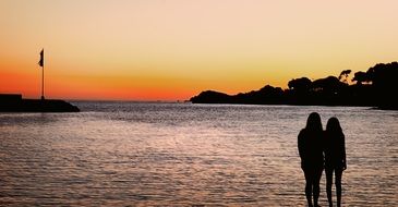 People and sunset on the beach