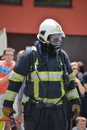 Man in fire wear protective equipment