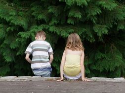 children face the forest
