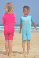 boy and girl in swimsuits