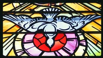 picture of the bird in stained glass in the Church