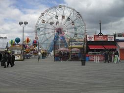 cloudy sky over the ferris wheel