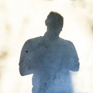 silhouette of a man in a haze