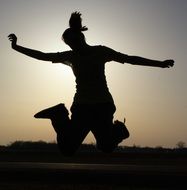 Silhouette of the jumping girl