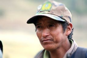 a man in a baseball cap in bolivia