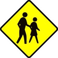 yellow sign with two pedestrians