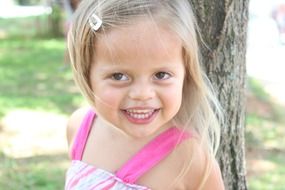 cute blonde girl with hair clip
