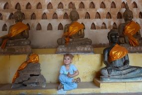 small girl in lotus position