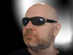 bald head man with sunglasses