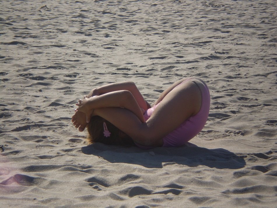 gymnastics on the sand on the beach