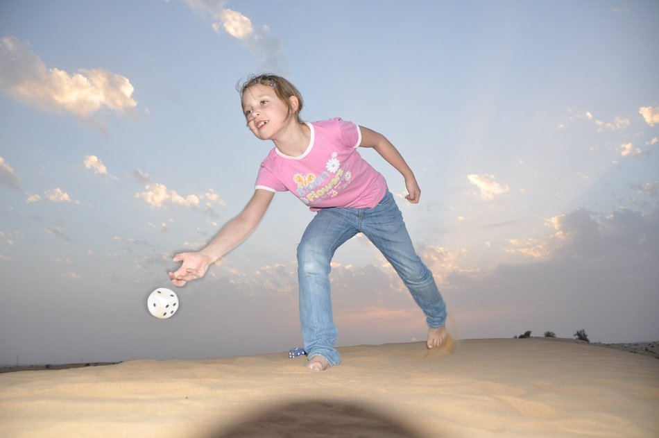 picture of the girl playing on a beach