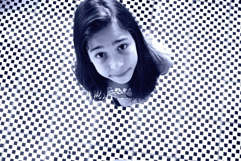 girl on the black and white floor