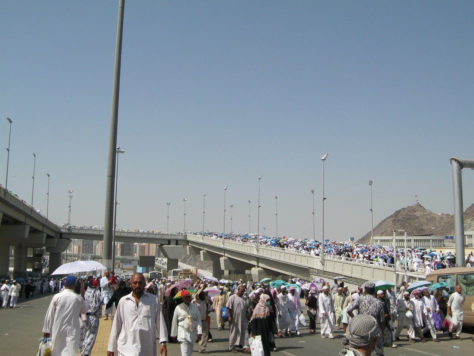 pilgrims near the bridge in mecca