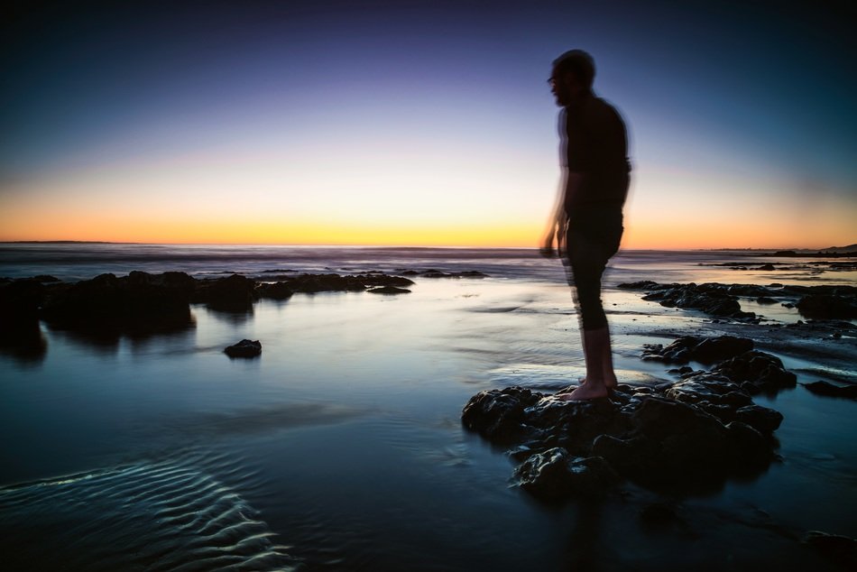 moving man on coast shore dust view
