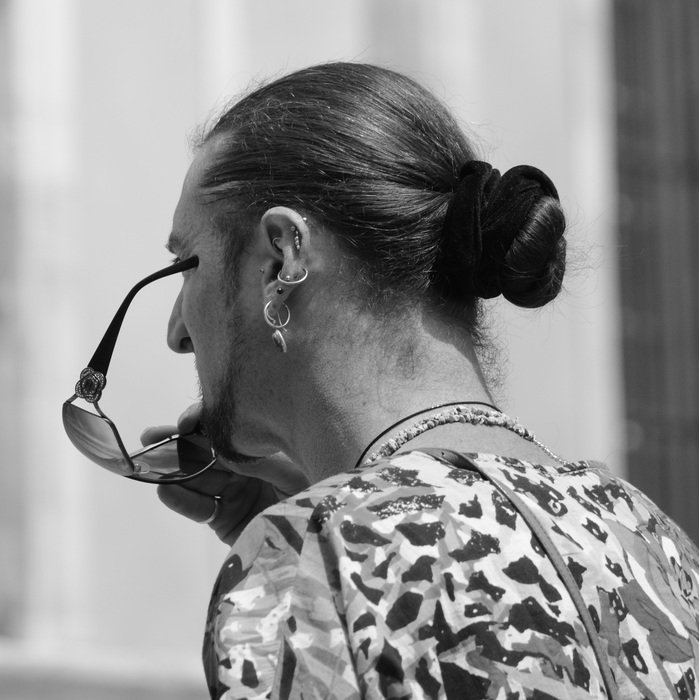 photo of a man in sunglasses from the back