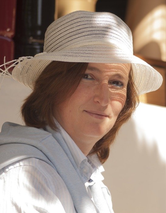 caucasian woman in hat, portrait