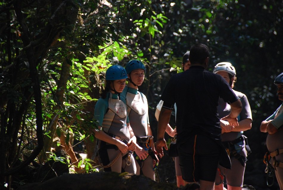 briefing young tourists before climbing