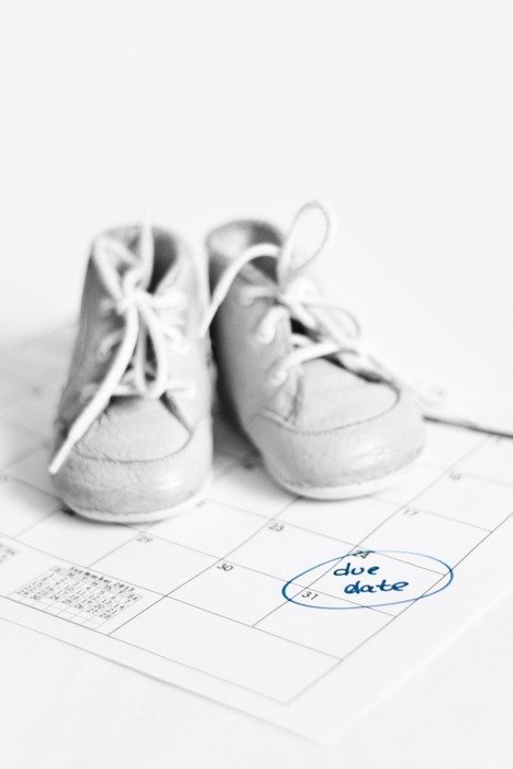 baby shoes on the calendar